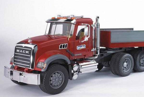 Bruder Mack Granite Flatbed Truck with Loader Backhoe (Montreal, In-Store or Pickup ONLY)